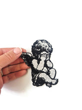 Load image into Gallery viewer, Crying Angel Embroidered Patch Sad Cherub Iron On PatchBags - Renaissance Art Inspired Applique - Black and White Angel Wing Patch

